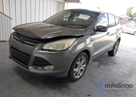2013 Ford Escape Sel z USA, uszkodzony, nr VIN 1FMCU0H95DUC94526